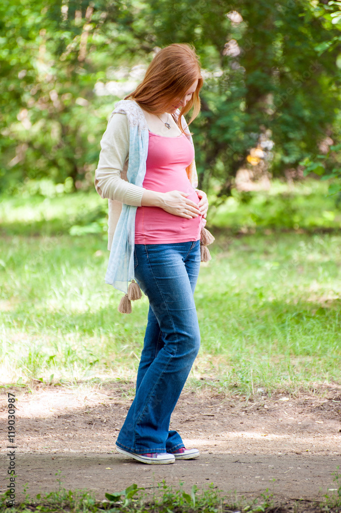 The pregnant redhead woman The pregnant redhead woman