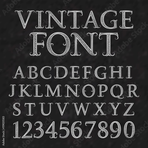 Vintage patterned letters and numbers. Font in floral baroque style. Vintage latin alphabet with numbers. Vintage white capital letters and numbers on a black textured background.