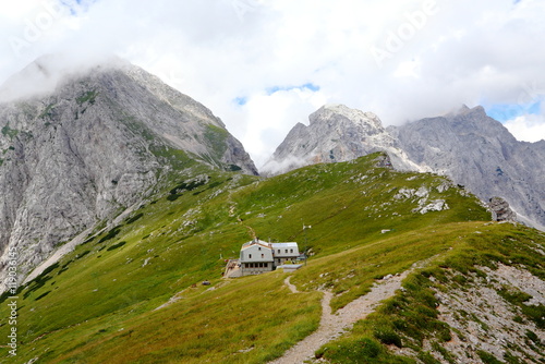 Kamniška koča na Kamniškem sedlu (1864 m). Kamniško-Savinjske Alpe; Kamnik-Savinja Alps; Steiner Alpen. Avgust 2016. photo