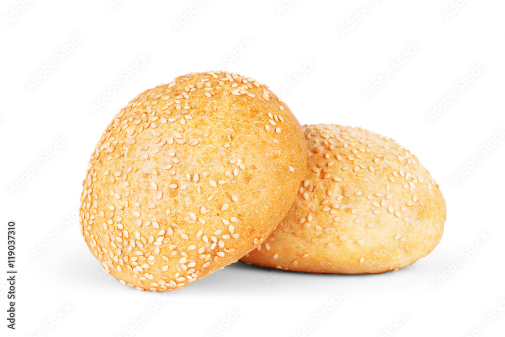 Round sandwich bun with sesame seeds isolated on white backgroun Round sandwich bun with sesame seeds isolated on white backgroun
