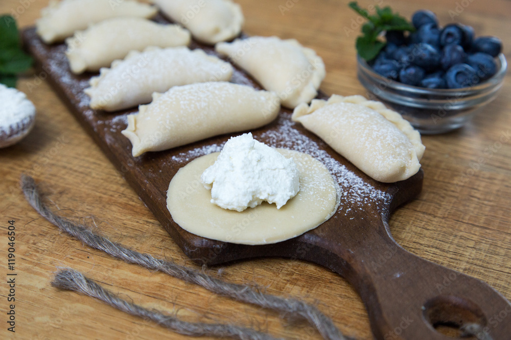 Dumplings with cottage cheese and blueberry