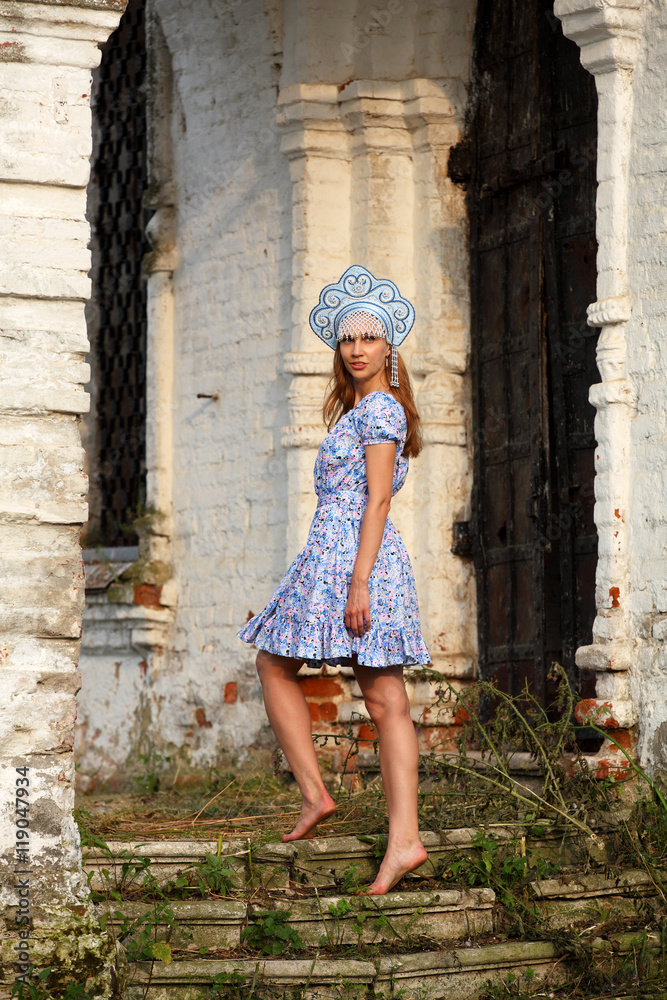 Young woman with traditional Russian head-dress Kokoshnik