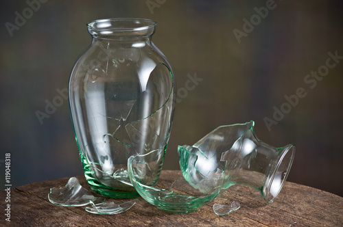 Photography broken glass vase on old wood table