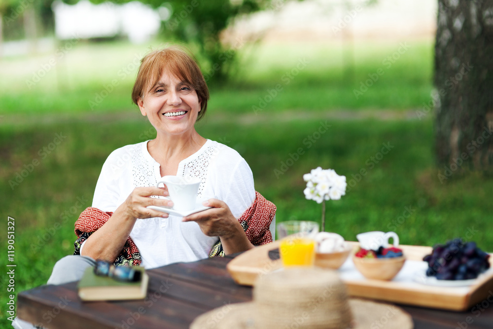 Senior woman enjoying themselves outdoors Senior woman enjoying themselves outdoors