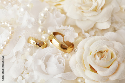 wedding rings, pearls and flowers