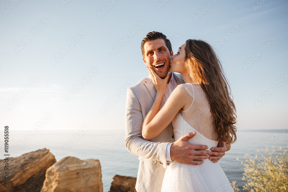 Happy just married young wedding couple celebrating Happy just married young wedding couple celebrating