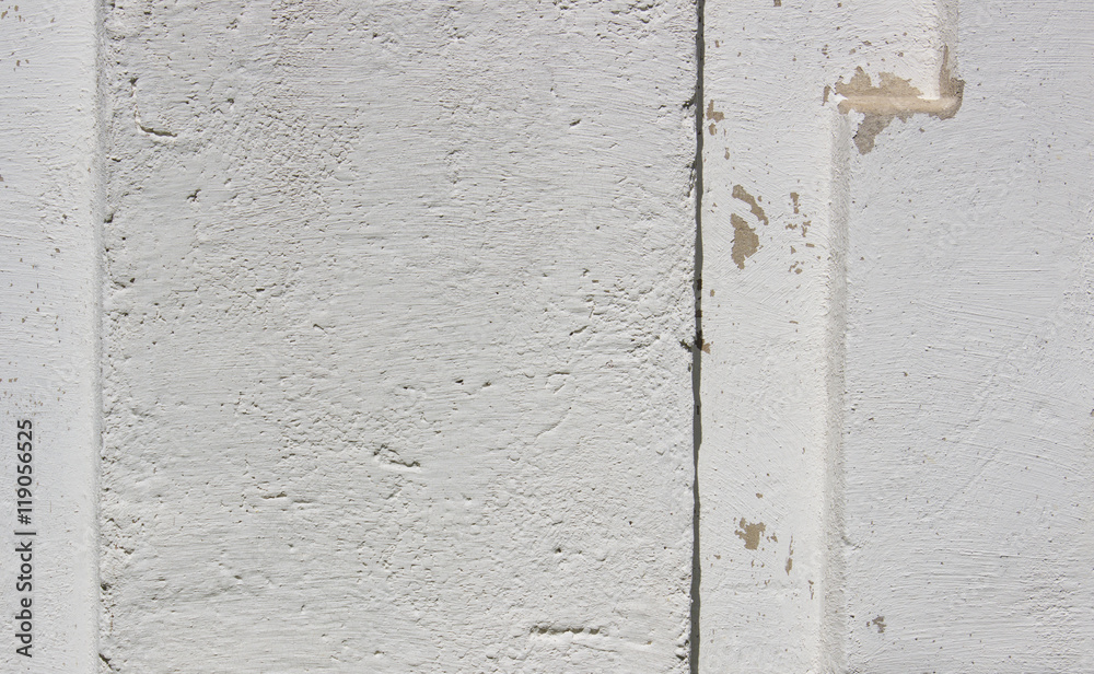 Concrete wall background. Gray uneven surface of cement. Concrete wall background. Gray uneven surface of cement.