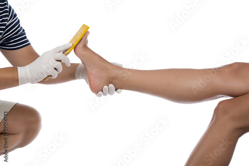 Beautician Scrubbing Female Foot