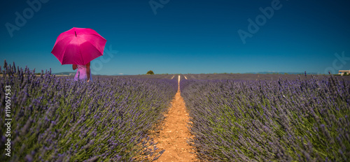 Woman in Lavender field with umbrella