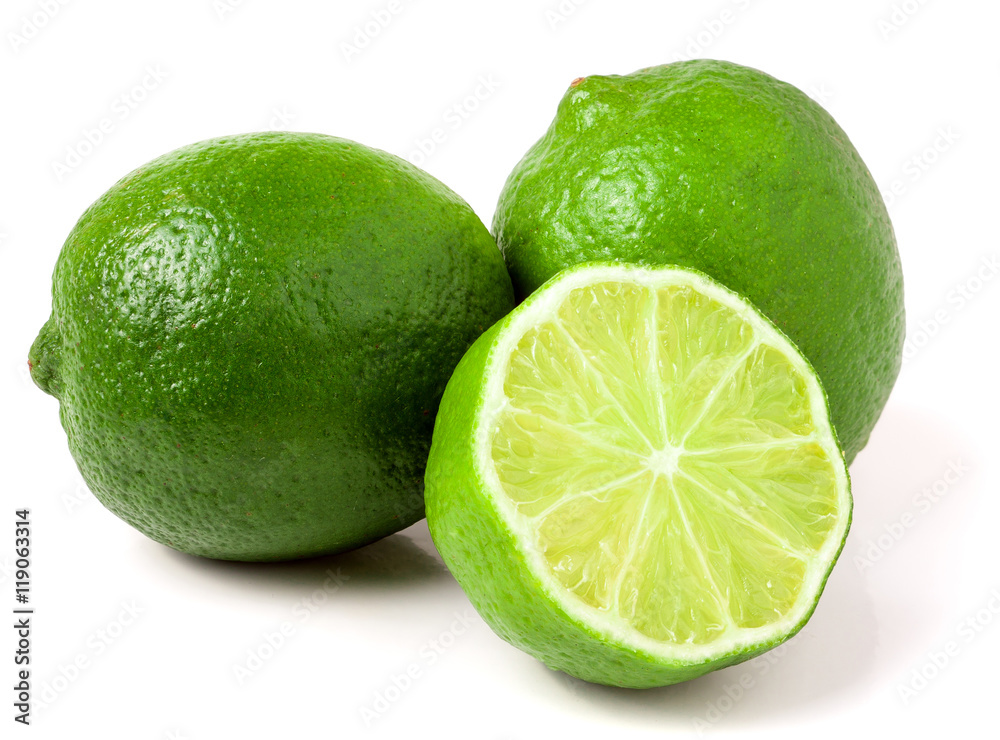 two limes with half isolated on white background two limes with half isolated on white background