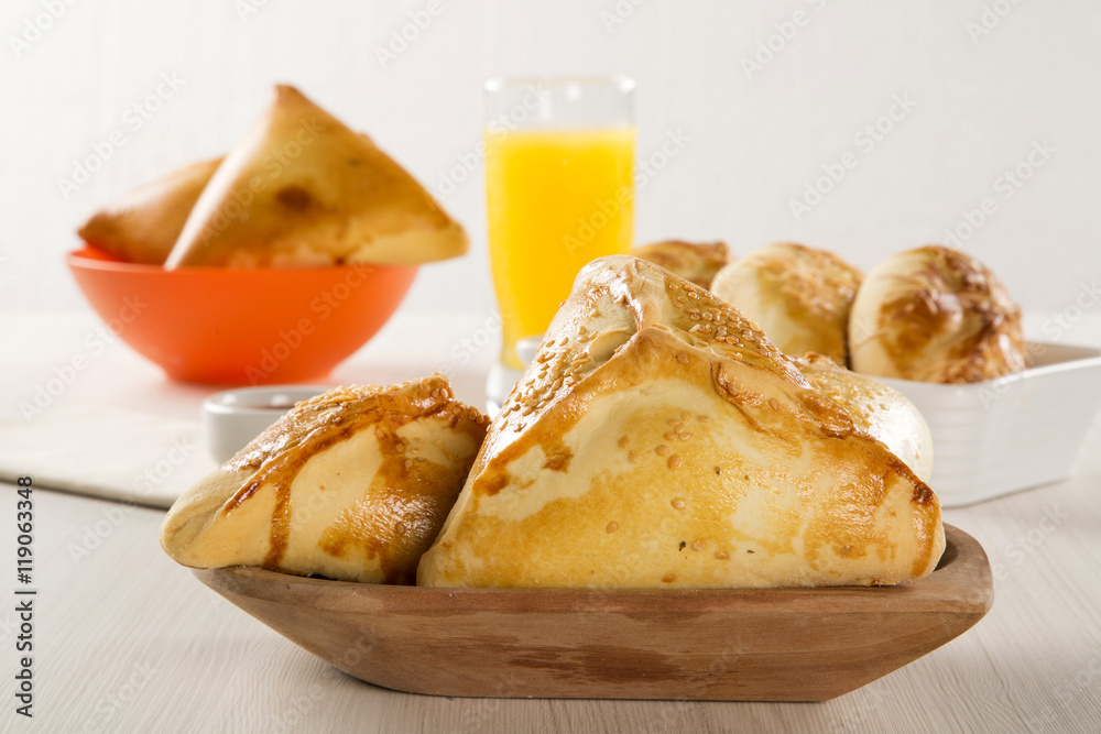 Brazilian snack. Meat Esfiha on the table