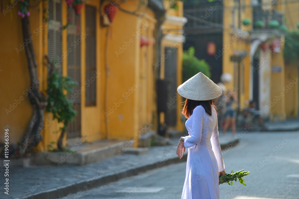 Beautiful  woman with Vietnam culture traditional dress,Ao dai is famous traditional costume ,vintage style,Vietnam
