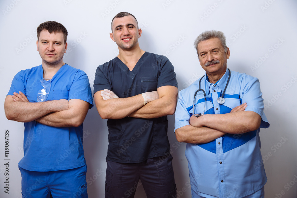 Below view of surgeons holding medical instruments in hands. Concept a healthy