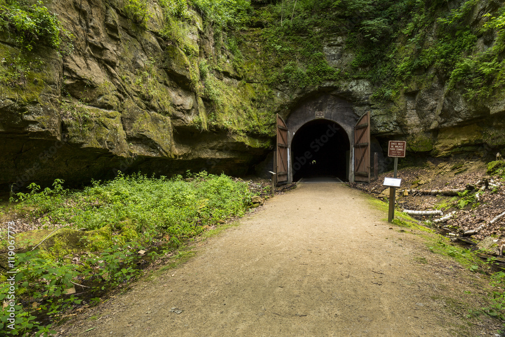 Bike Trail Tunnel / A bike trail passing through a former railroad tunnel. Bike Trail Tunnel / A bike trail passing through a former railroad tunnel.