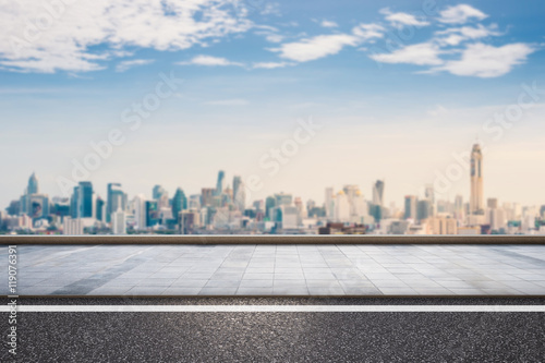 roadside with cityscape background