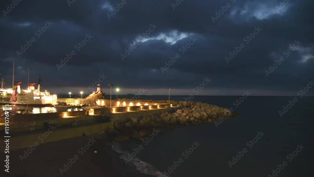 Yacht marina at sunrise. Timelapse of cloudy sky over yacht port. Yacht marina at sunrise. Timelapse of cloudy sky over yacht port.