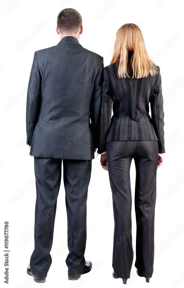 Back view of business team look into the distance. young couple (man ...