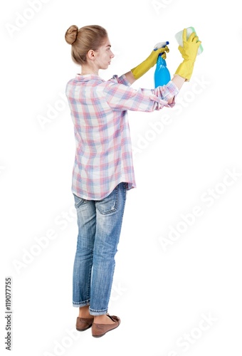 Back view of a housewife in gloves with sponge and detergent. girl watching. Rear view people collection. backside view of person. Isolated over white background.