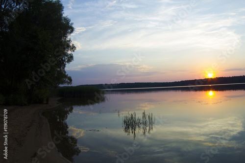 Sunset on the Volga river  the sun sets over the horizon