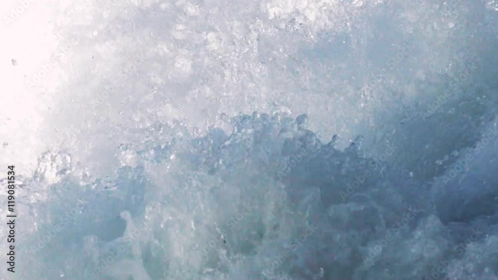 A strong flow of fresh, sea water. Flowing water, flood. Slow motion, close up view. Outside shooting. A strong flow of fresh, sea water. Flowing water, flood. Slow motion, close up view. Outside shooting.