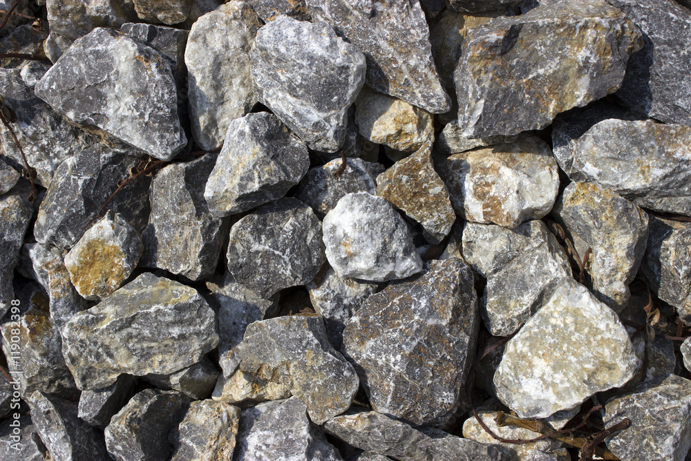 Rough uneven gray stone background old curve sprinkled gravel Rough uneven gray stone background old curve sprinkled gravel