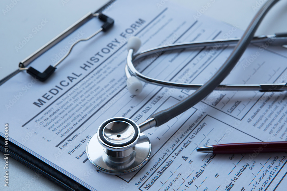 Medical concept with stethoscope on medical history form. Medical concept with stethoscope on medical history form.