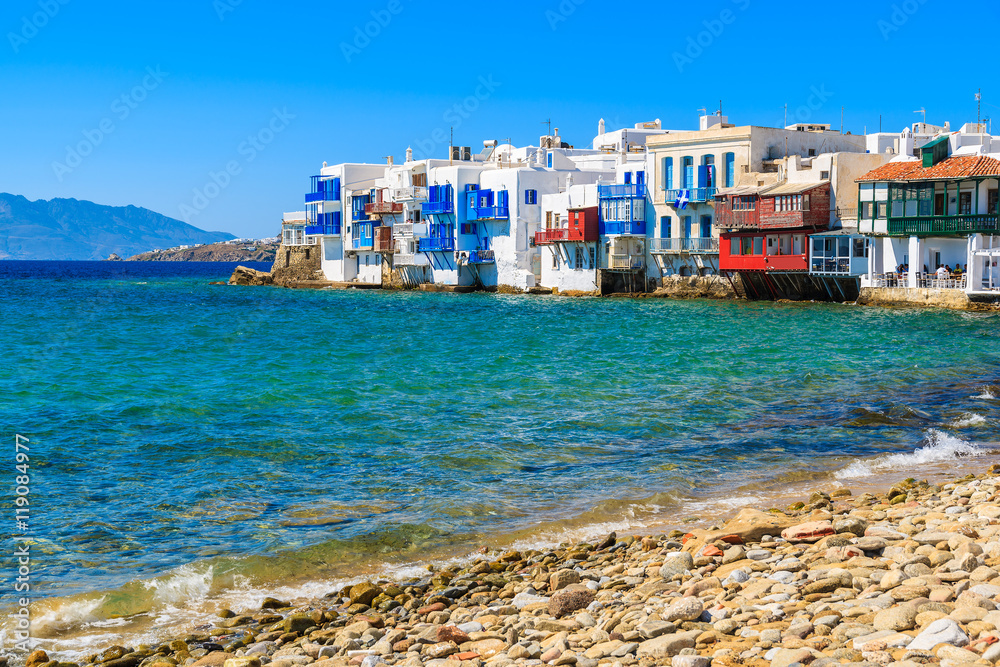 View of beautiful beach and colorful houses of Little Venice part of Mykonos town, Greece