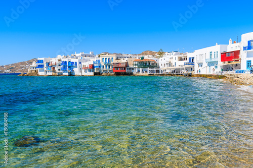View of beach and Little Venice part of Mykonos town with colorful houses, Greece