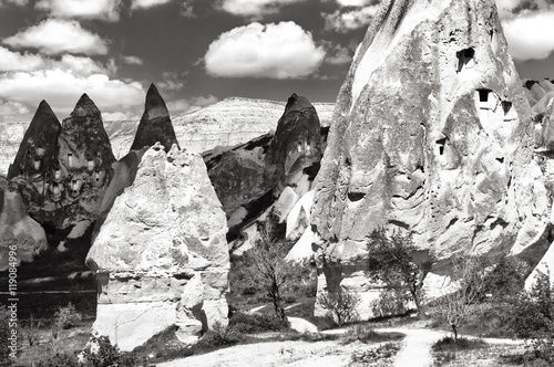 Fotografie Fantastic black and white landscape with cone-shaped rocks .