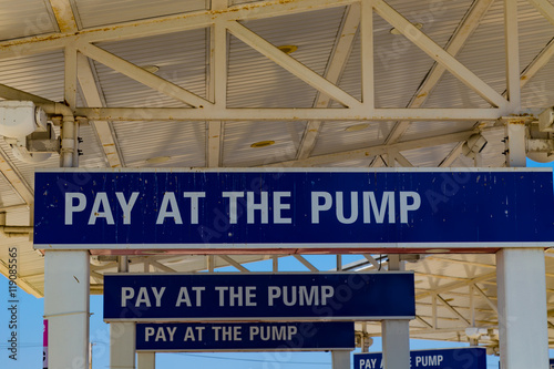 Pay at the Pump signs