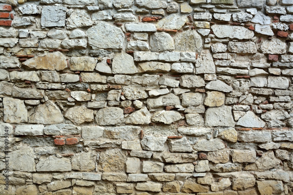 Fototapeta premium Stone wall with abstract pattern
