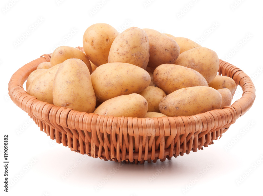 Potato tuber in wicker basket isolated on white background Potato tuber in wicker basket isolated on white background