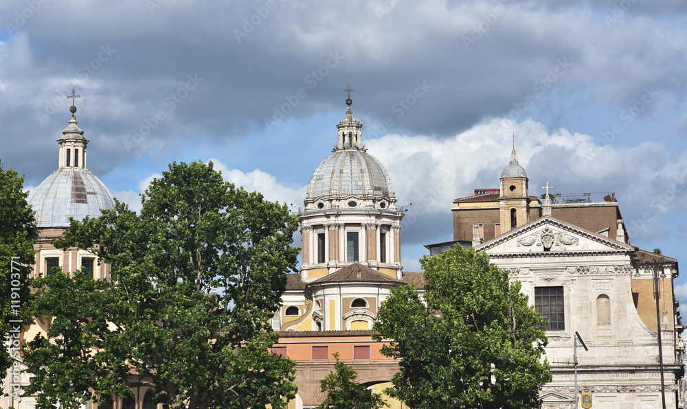 Baroque domes and churches in Rome with beautiful clouds