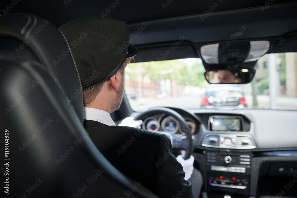 Male Chauffeur In Car