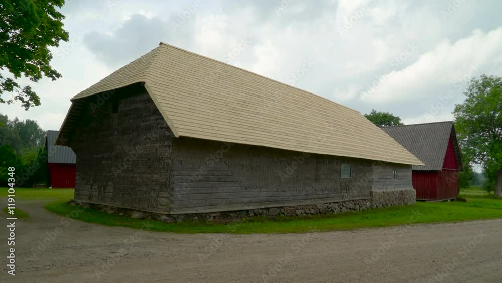 A big house cabin with a big roof there are also other houses on the village A big house cabin with a big roof there are also other houses on the village