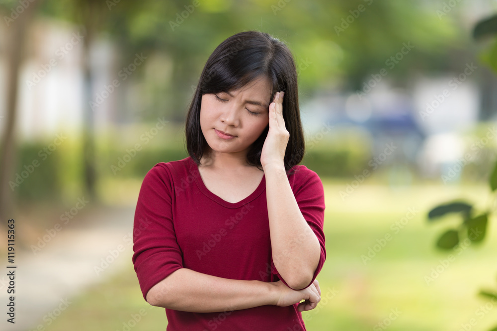 Woman Has Head Ache at Park Woman Has Head Ache at Park
