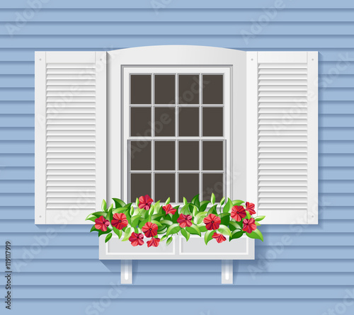 White window with flowers pot. © malinaanton