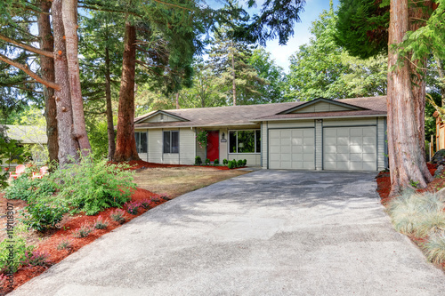 Wallpaper Mural American rambler exterior with double doors garage. Torontodigital.ca