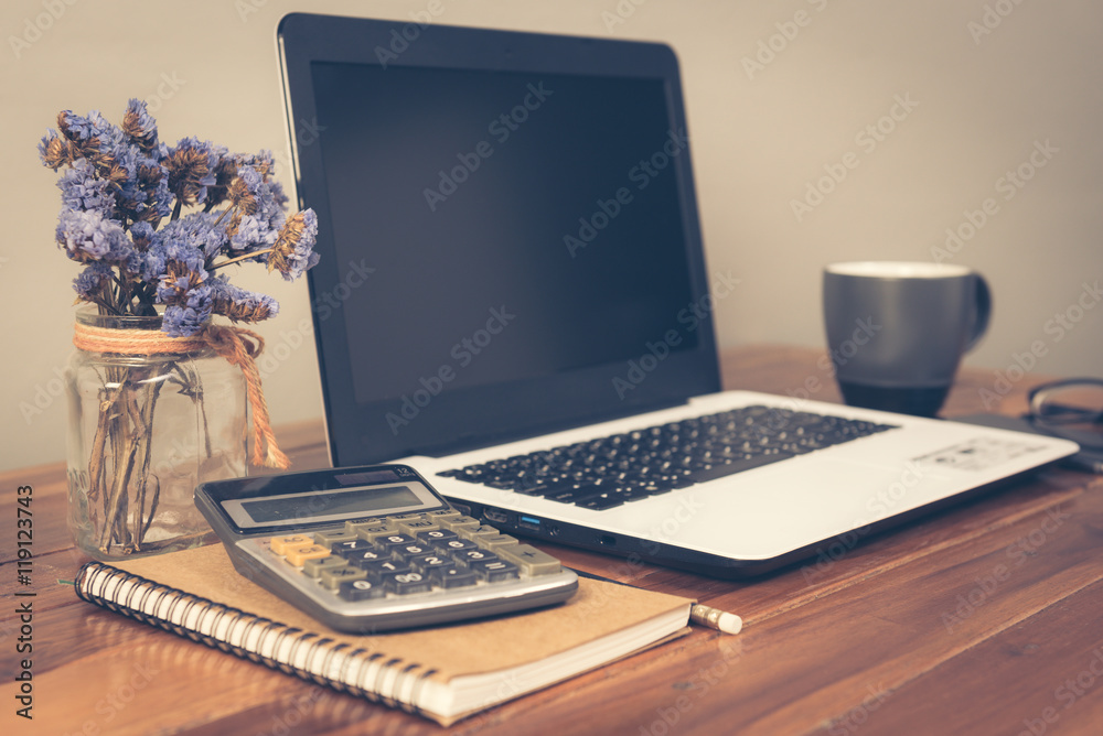 Office supplies on a wooden working table, Office workspace. Vintage retro picture style. Office supplies on a wooden working table, Office workspace. Vintage retro picture style.