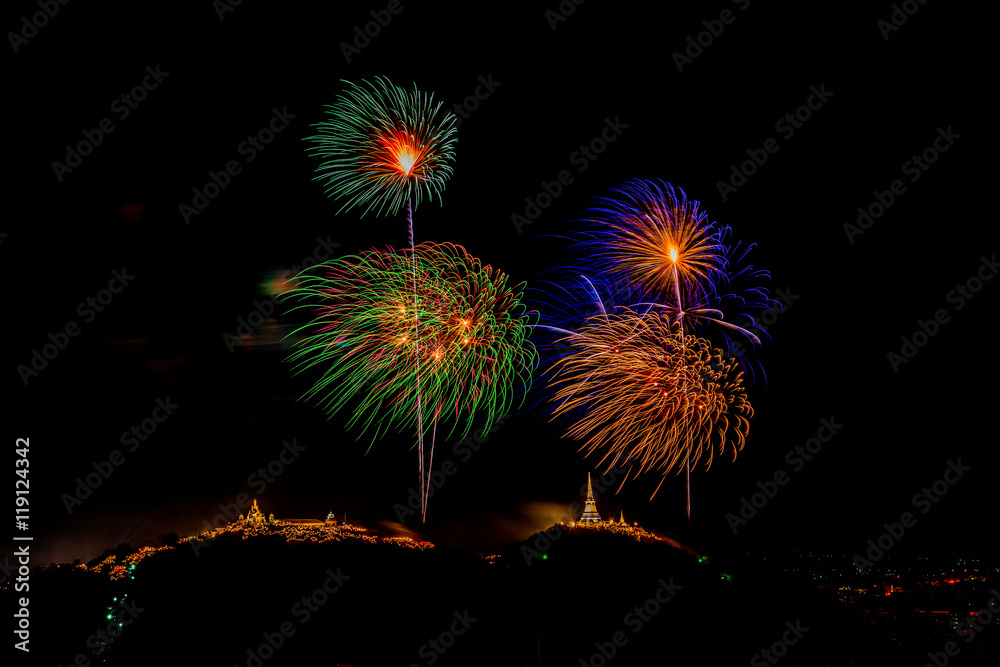 Fireworks on mountain / Fireworks at Kao Wang mountain, over the cityscape of Petchburi, Thailand