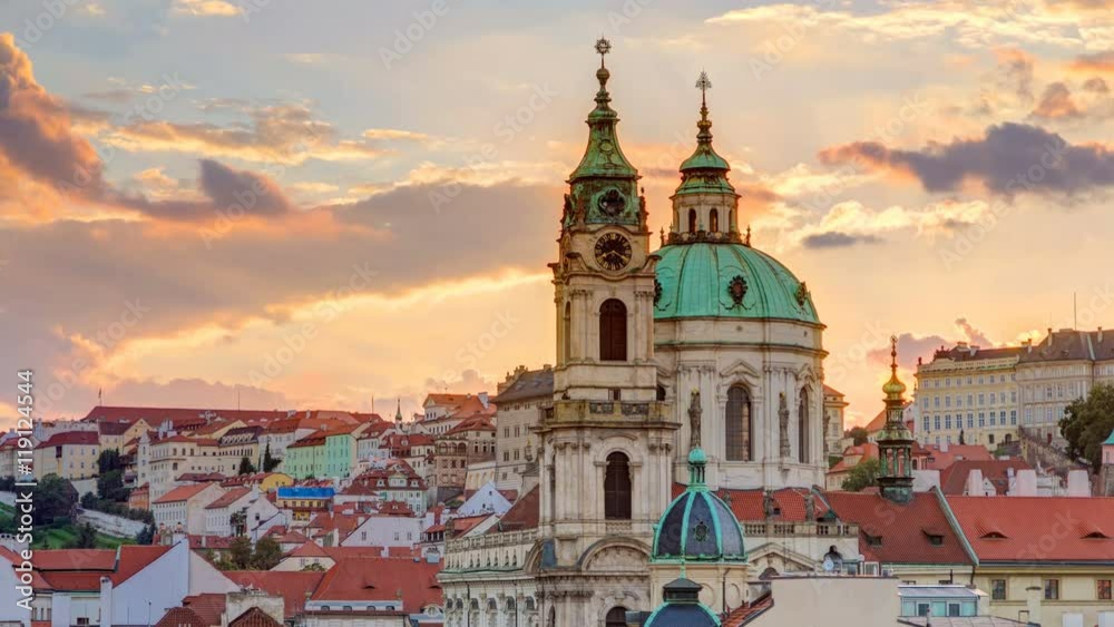 sunset behind St Nicolas timelapse in Mala Strana in Prague