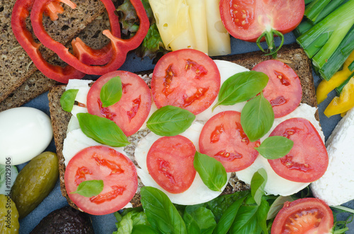 healthy sandwich with mozzarella, tomato and basil