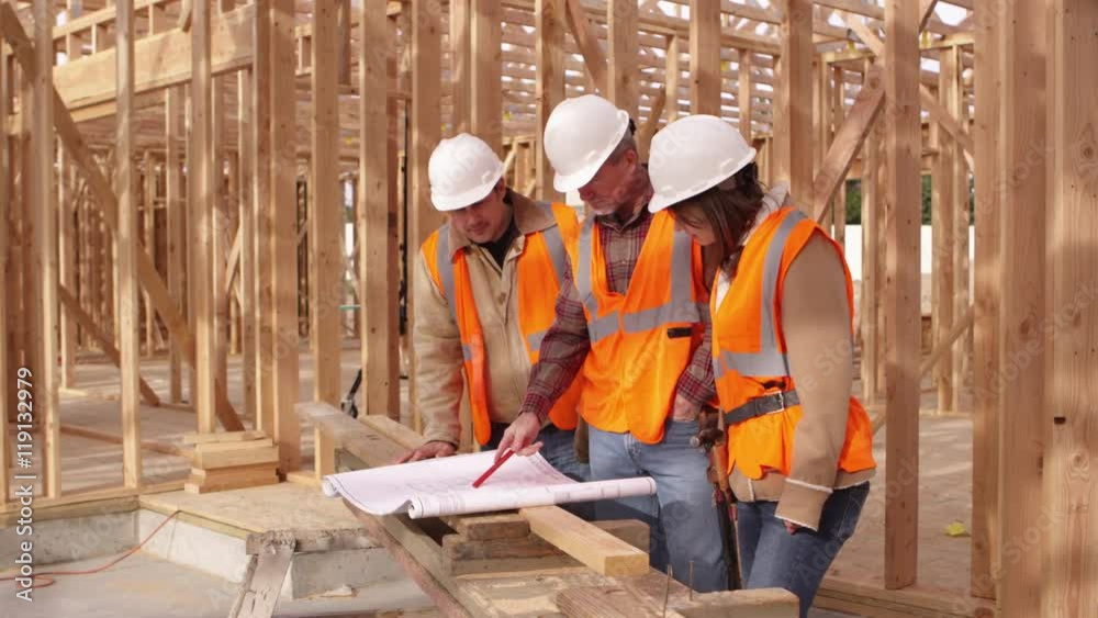 Portrait of three construction workers
