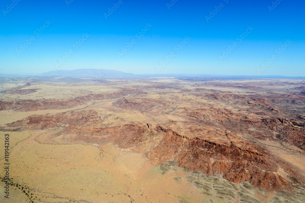 Aerial view of Namibia with the Brandberg on the horizon.
