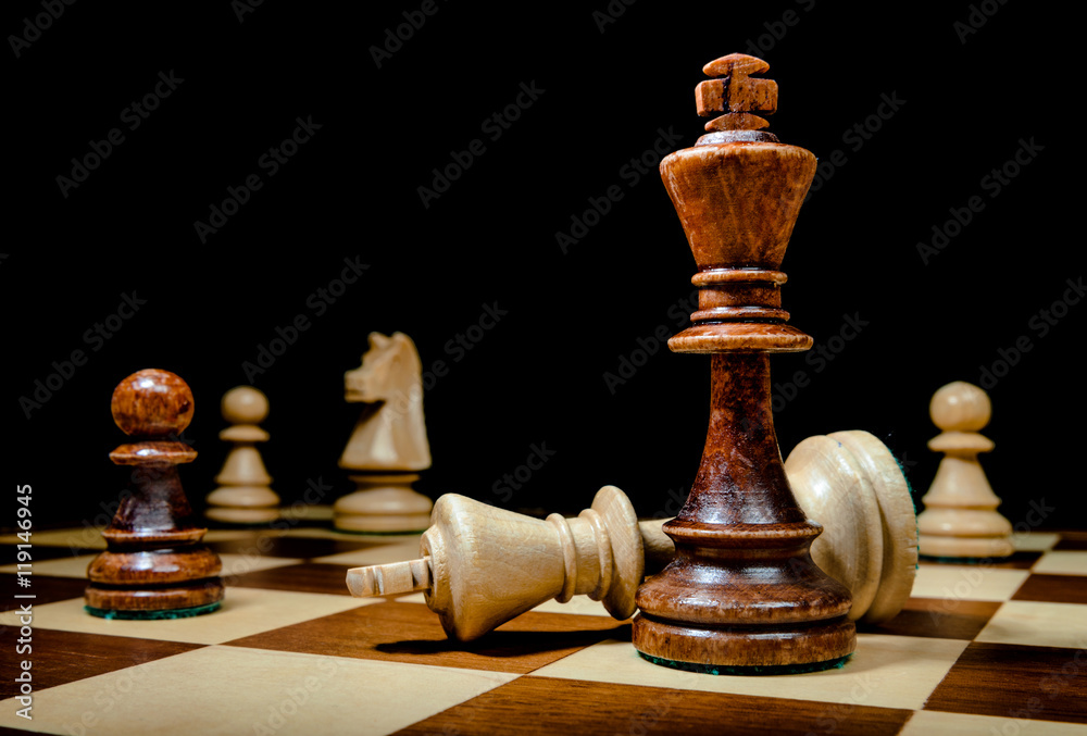 One chess king dominating another.