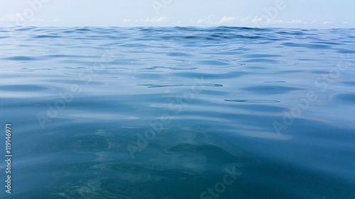 Surface of the warm sea with salt water