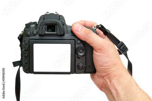 SLR digital camera in human hand