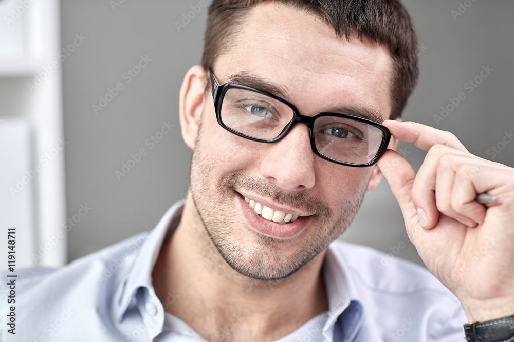 portrait of businessman in eyeglasses at office portrait of businessman in eyeglasses at office