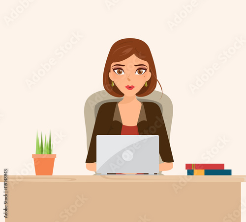 business woman working at her office desk with laptop.