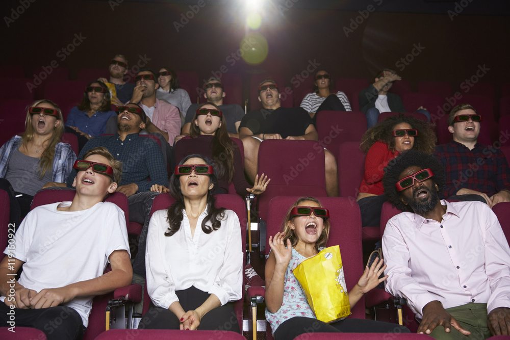 Naklejka premium Audience In Cinema Wearing 3D Glasses Watching Horror Film